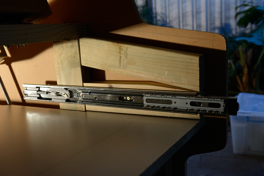 picture of drawer rail attached to cabinet