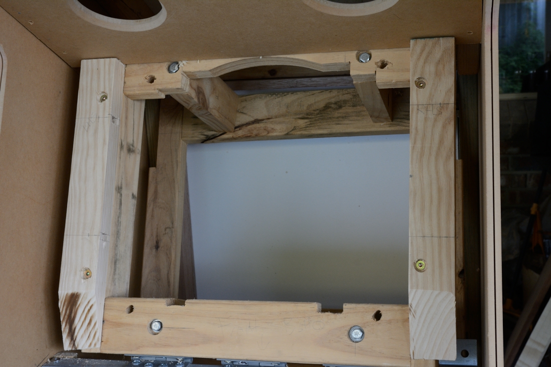 picture of timber frames attached to existing montior frame