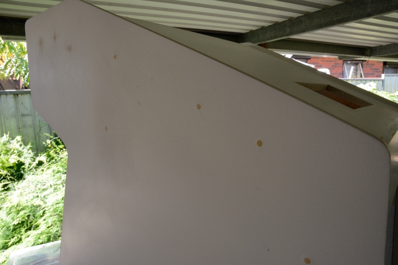 close-up of arcade with first undercoat and sanded back