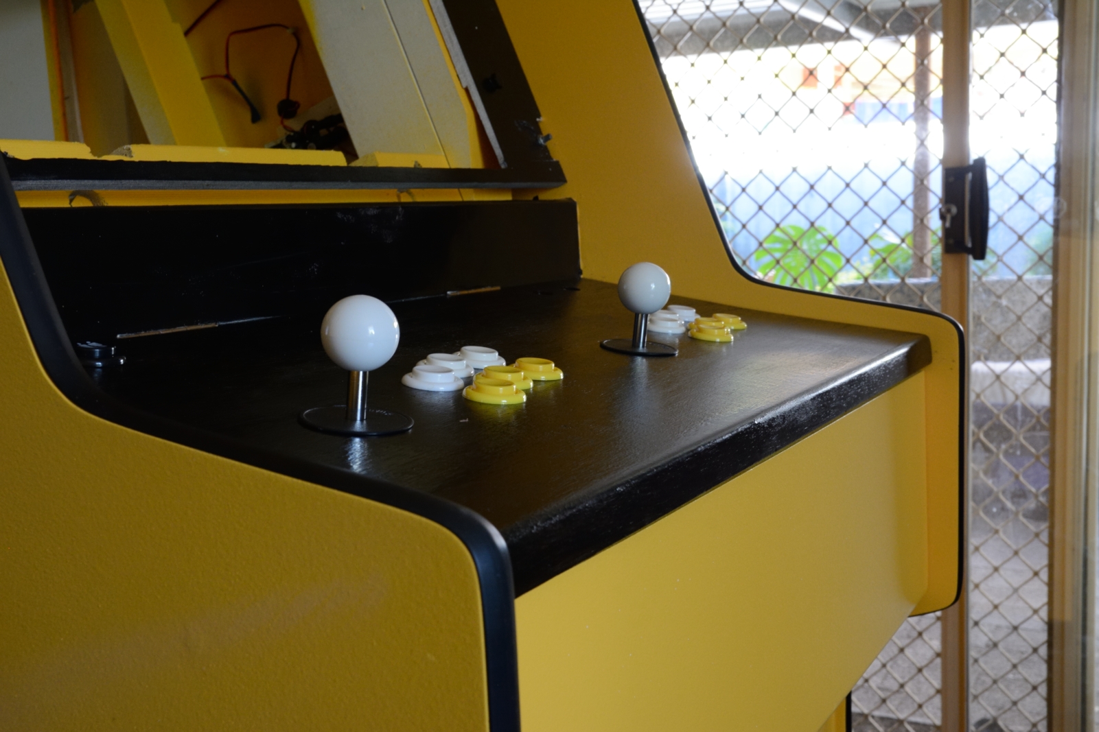 picture of top view of control panel with installed joysticks and buttons