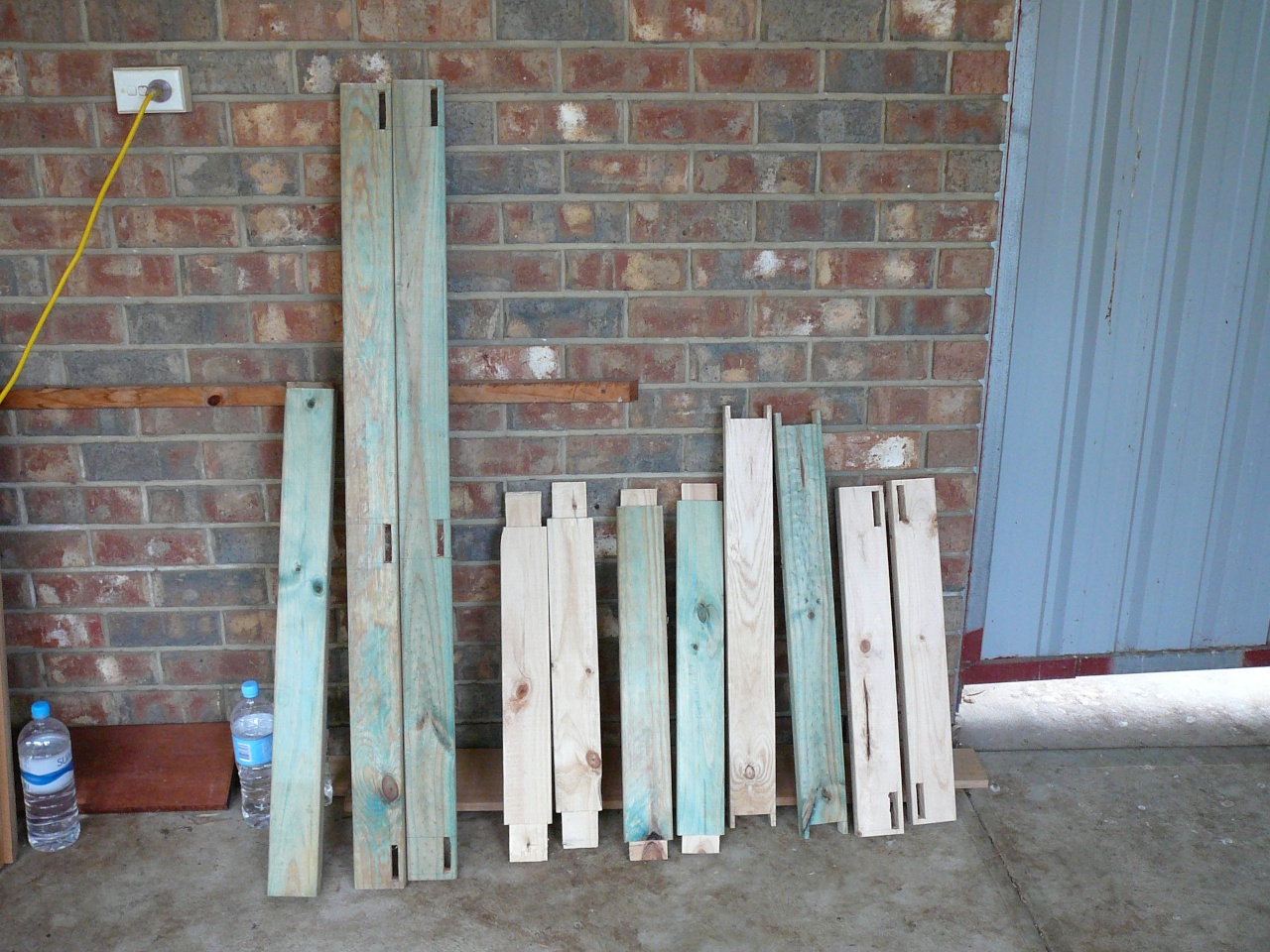 cut pieces of wood for the cabinet frame